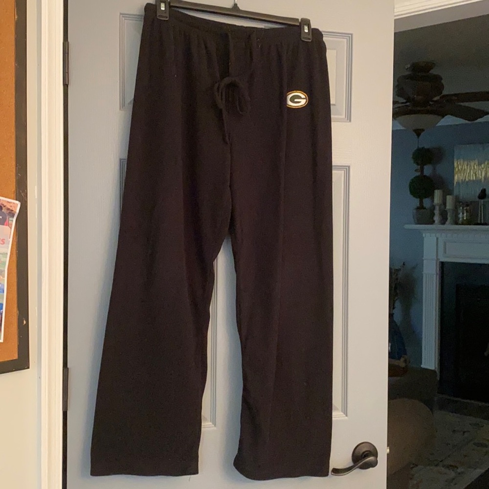 Green Bay Packer sweatpants.